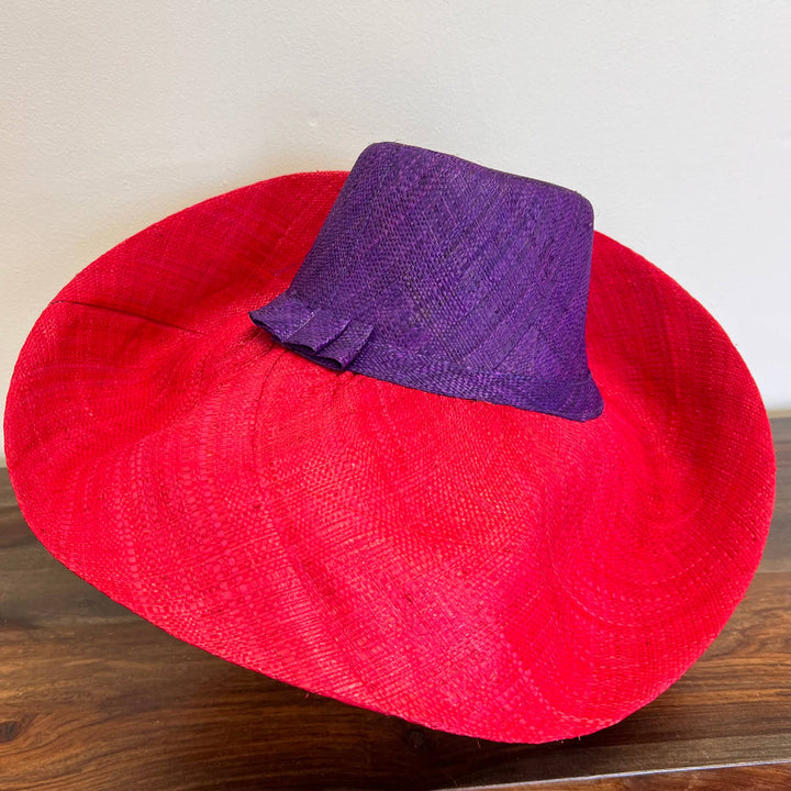 Stylish natural fiber raffia hat with boho beach vibes.