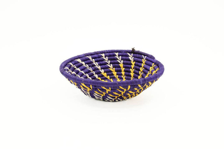 Fair trade African raffia wall basket, handwoven decorative bowl made from natural dyed fiber, perfect for boho wall art or home decor.