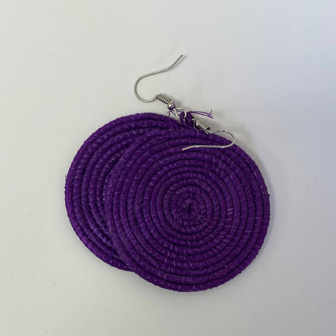 Handcrafted purple raffia earrings set with nickel-free ear wires.