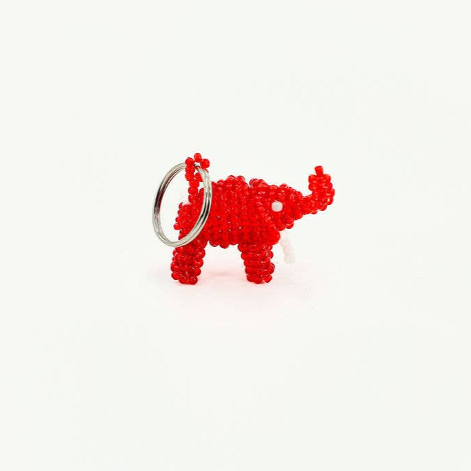 Bright red beaded elephant keychain crafted from colorful glass beads, perfect as a zipper pull or bag charm.
