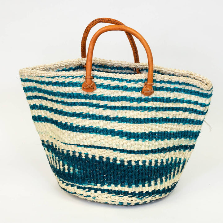 Indigo and natural Kenyan woven tote ideal for shopping or storage.
