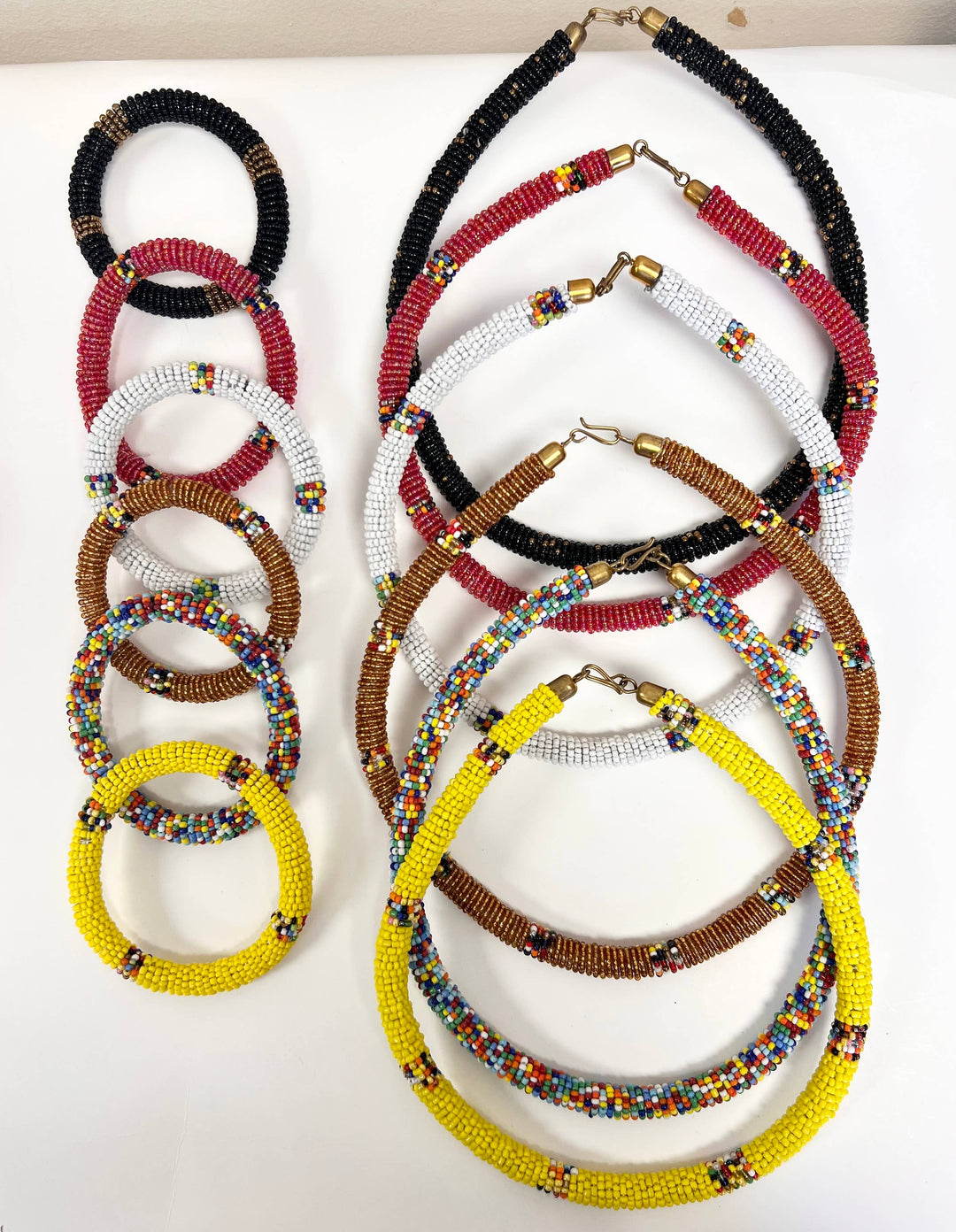 Handmade beaded jewelry set from Kenya in assorted bold color patterns.