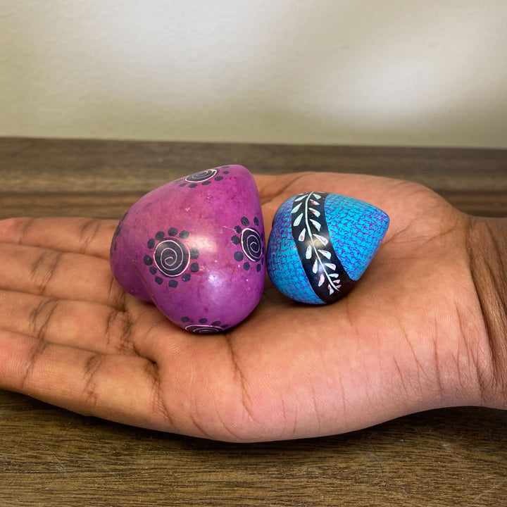 Hand-carved fair trade soapstone heart in vibrant colors.