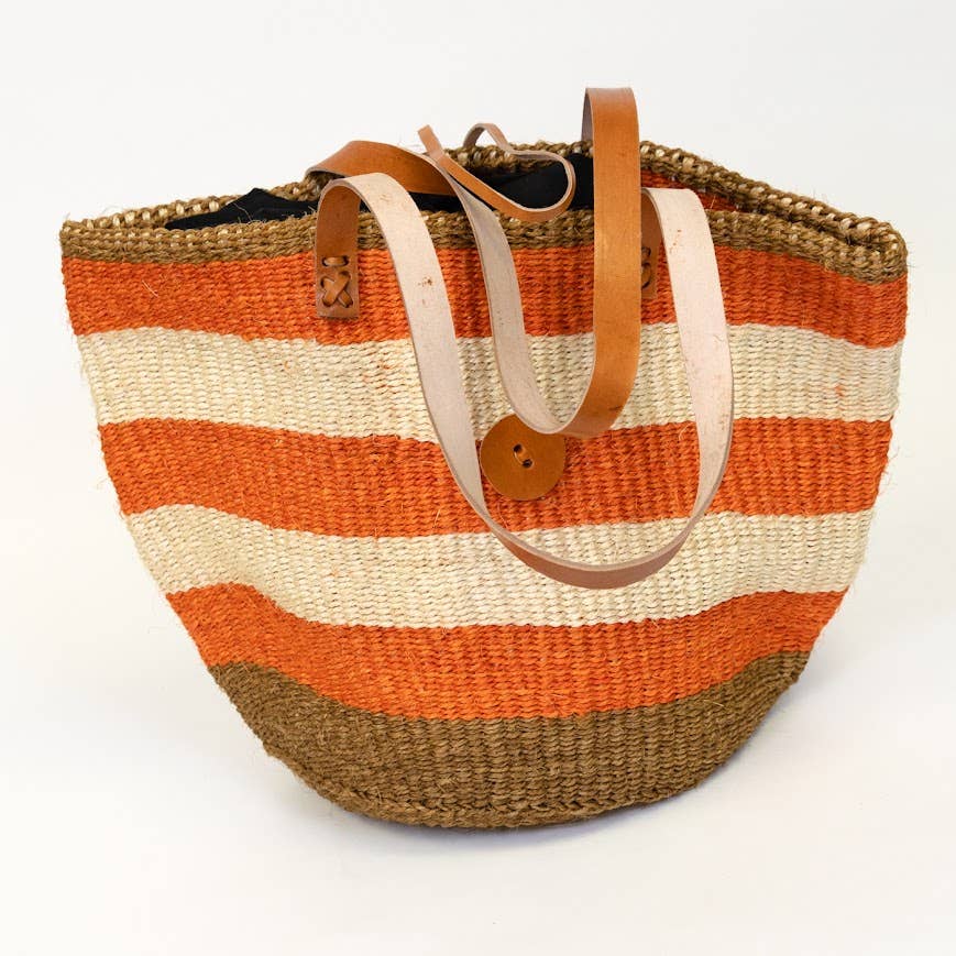 Handwoven tropical-colored tote bag with leather straps and fair trade craftsmanship from Kenya.