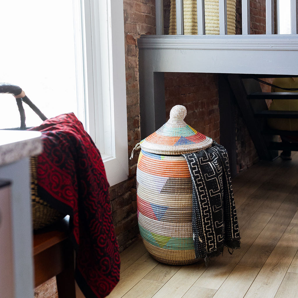 Sweetgrass hamper with recycled plastic weave, used to organize clutter or add vibrant décor.