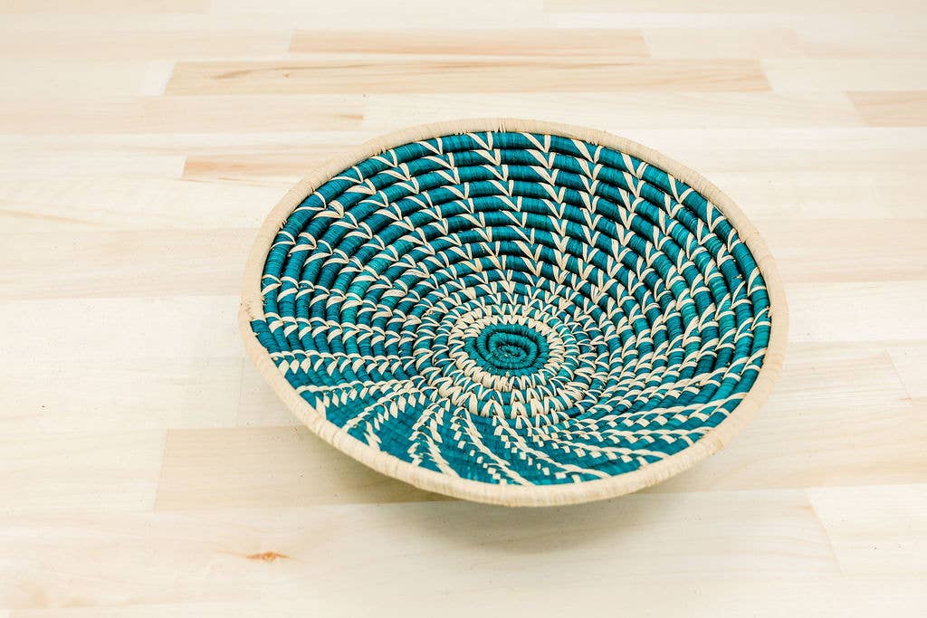 Fair trade raffia bowl, handwoven decorative basket made from hand-dyed natural fiber by skilled artisans in Africa.
