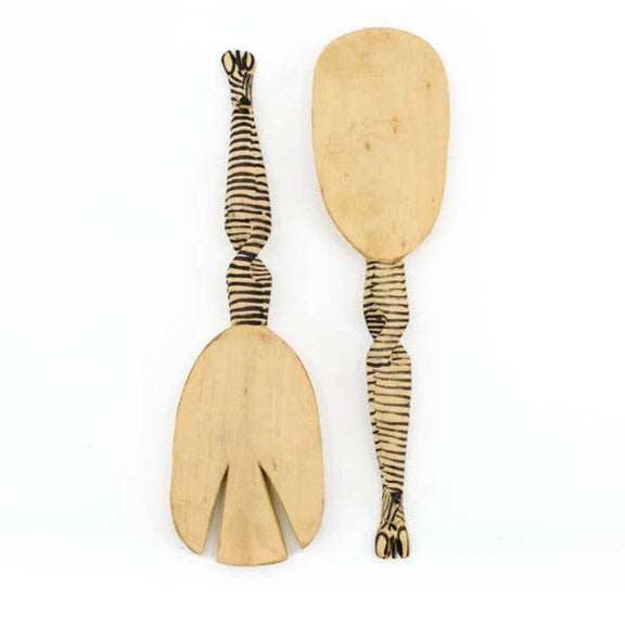 Hand-carved wooden serving spoons with hand-painted zebra animal handles.

