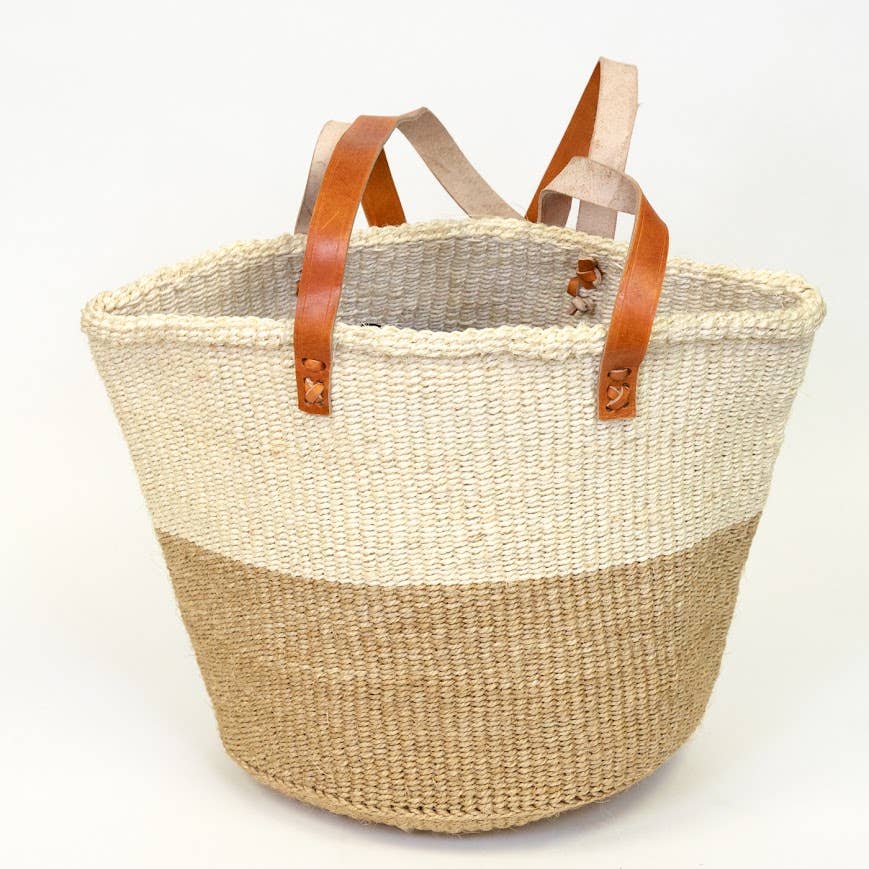 Two-tone natural striped sisal tote bag with leather shoulder straps, handwoven in Kenya.
