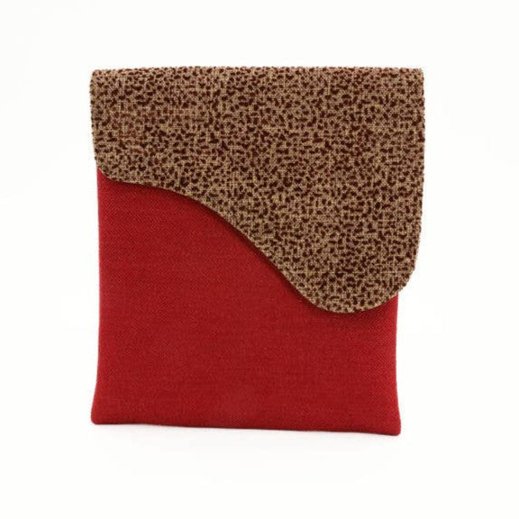 Fair trade bag crafted from remnant upholstery and traditional prints.