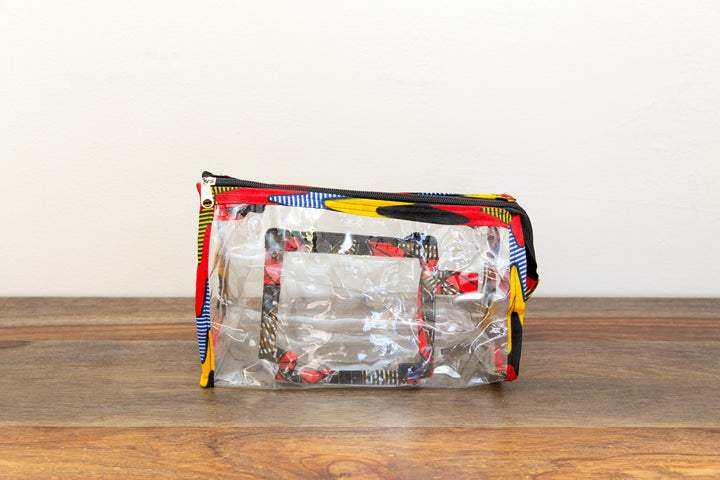 Eco-friendly toiletry bag featuring colorful patchwork design, perfect for travel or dorm essentials.