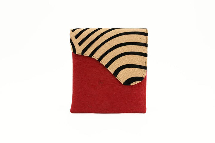 Sustainable crossbody purse with adjustable strap and bold colors.