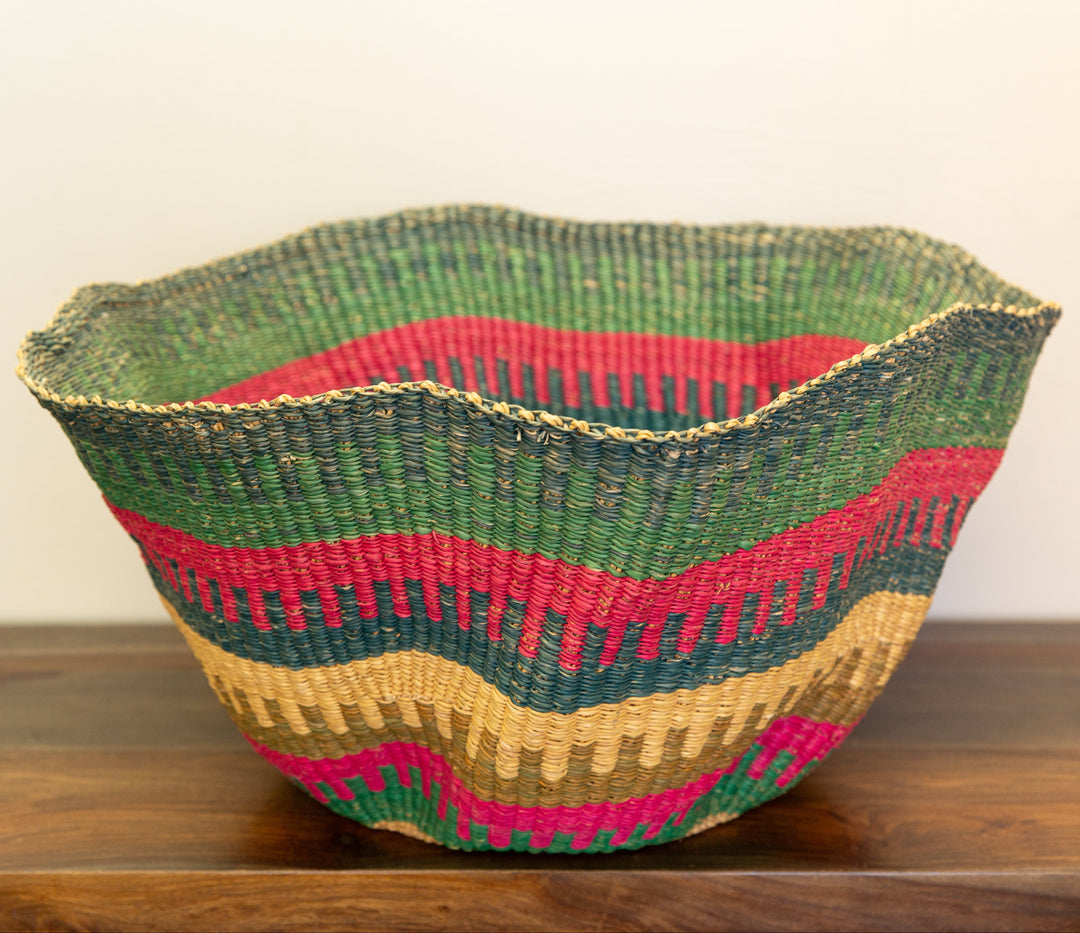 Ghanaian Kinkanhe straw basket with assorted patterns.