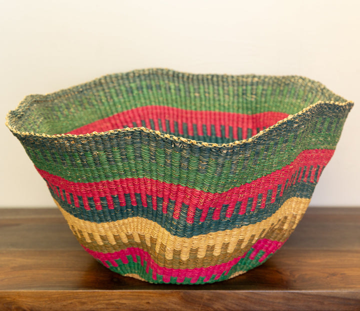 Ghanaian Kinkanhe straw basket with assorted patterns.