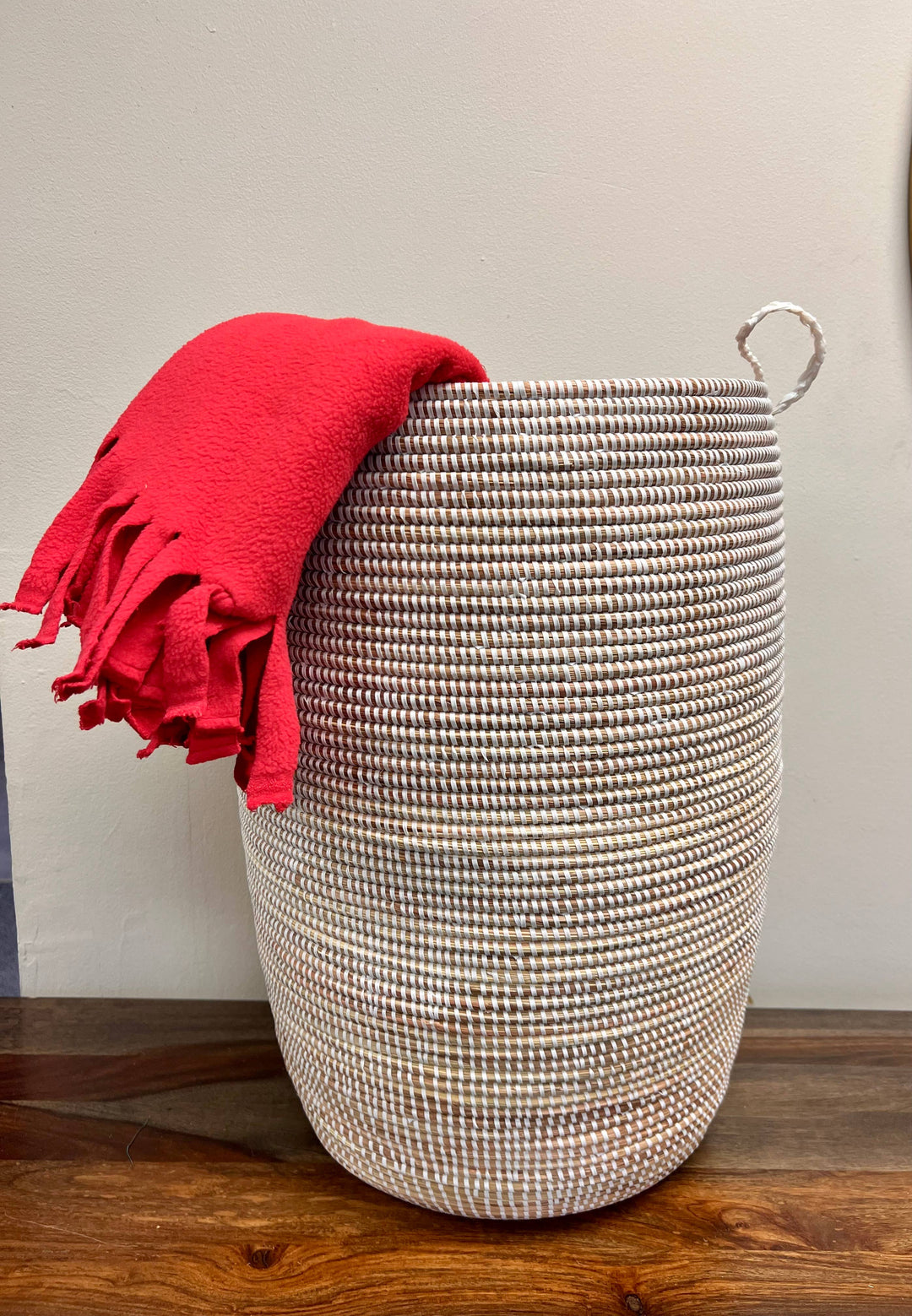 Handwoven Senegalese basket with lid, perfect for laundry or toy storage.