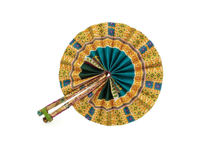 Fairtrade and handcrafted folding fan with leather handles and strap.