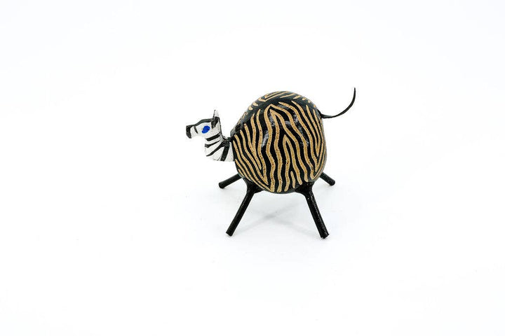 Fair trade zebra bobblehead figurine hand-carved from polished gourd, unique sustainable artisan decor.