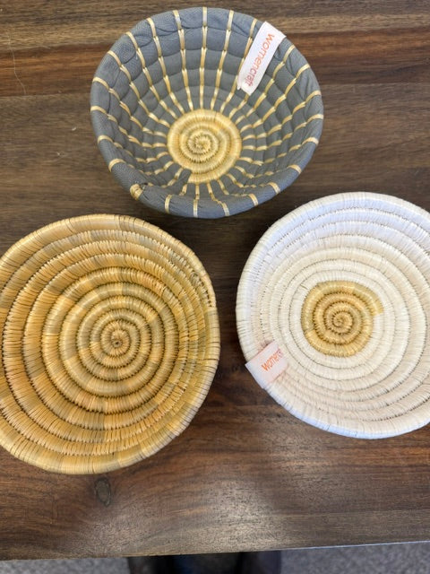 Aerial view of three of our bread baskets in natural, white and grey. Perfect for decor or proofing bread. 