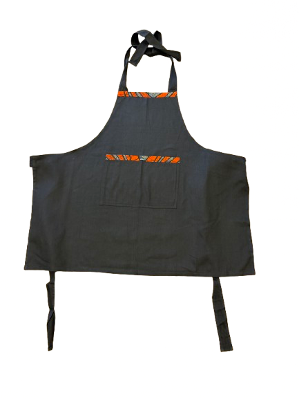 African print cotton apron handmade in Kenya with colorful textile details on a classic black base.