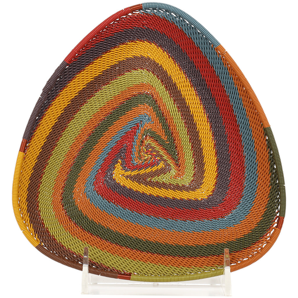 Detail of an African Zulu Wire Triangle Tray in African Rainbow color way, showing intricate wire weaving and artisan craftsmanship.