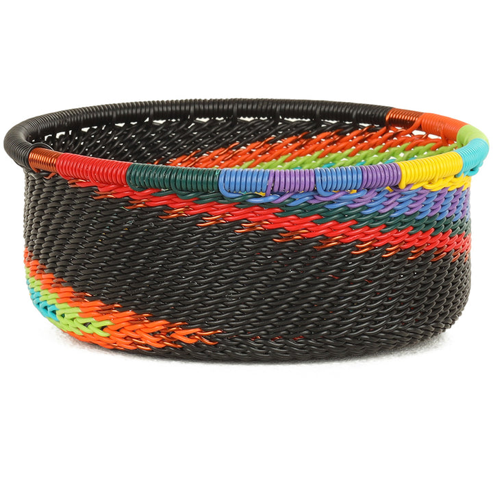 Handwoven Zulu Wire Tuna Cup Baskets in African Rainbow from South Africa in a variety of colorful and neutral artisan patterns.