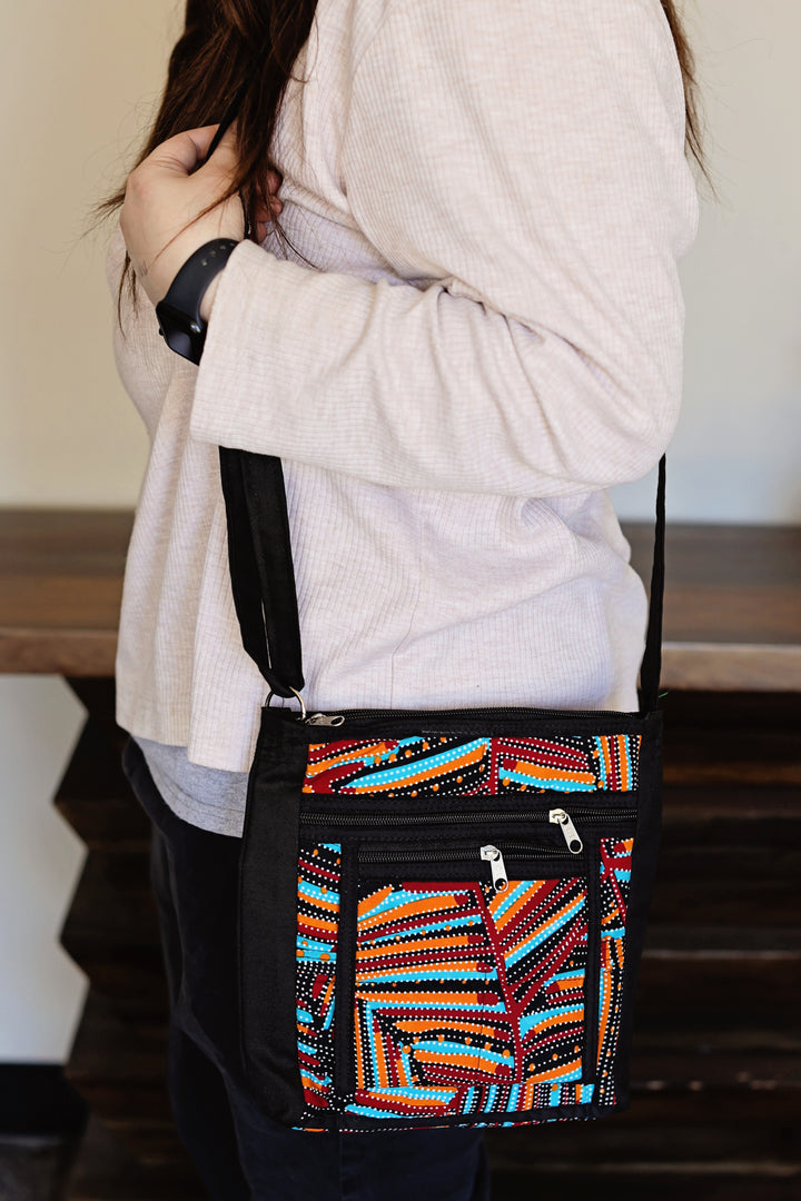 Assorted Lee crossbody bags made from up-cycled African fabric