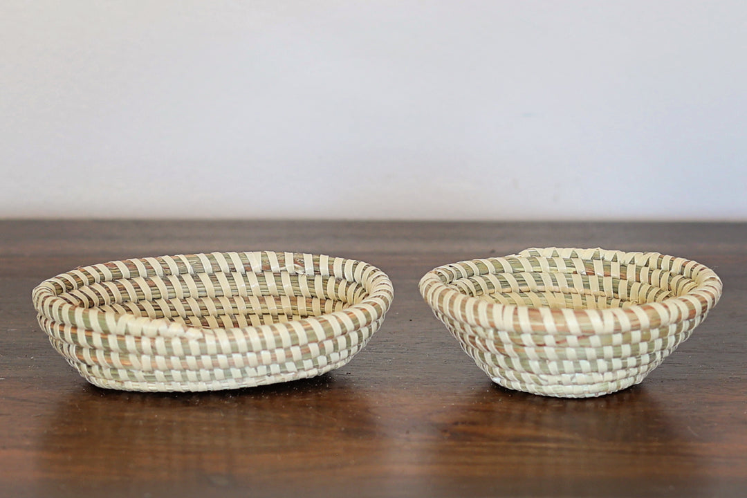 Assorted sweetgrass bowls in natural white and turquoise tones handmade by artisans
