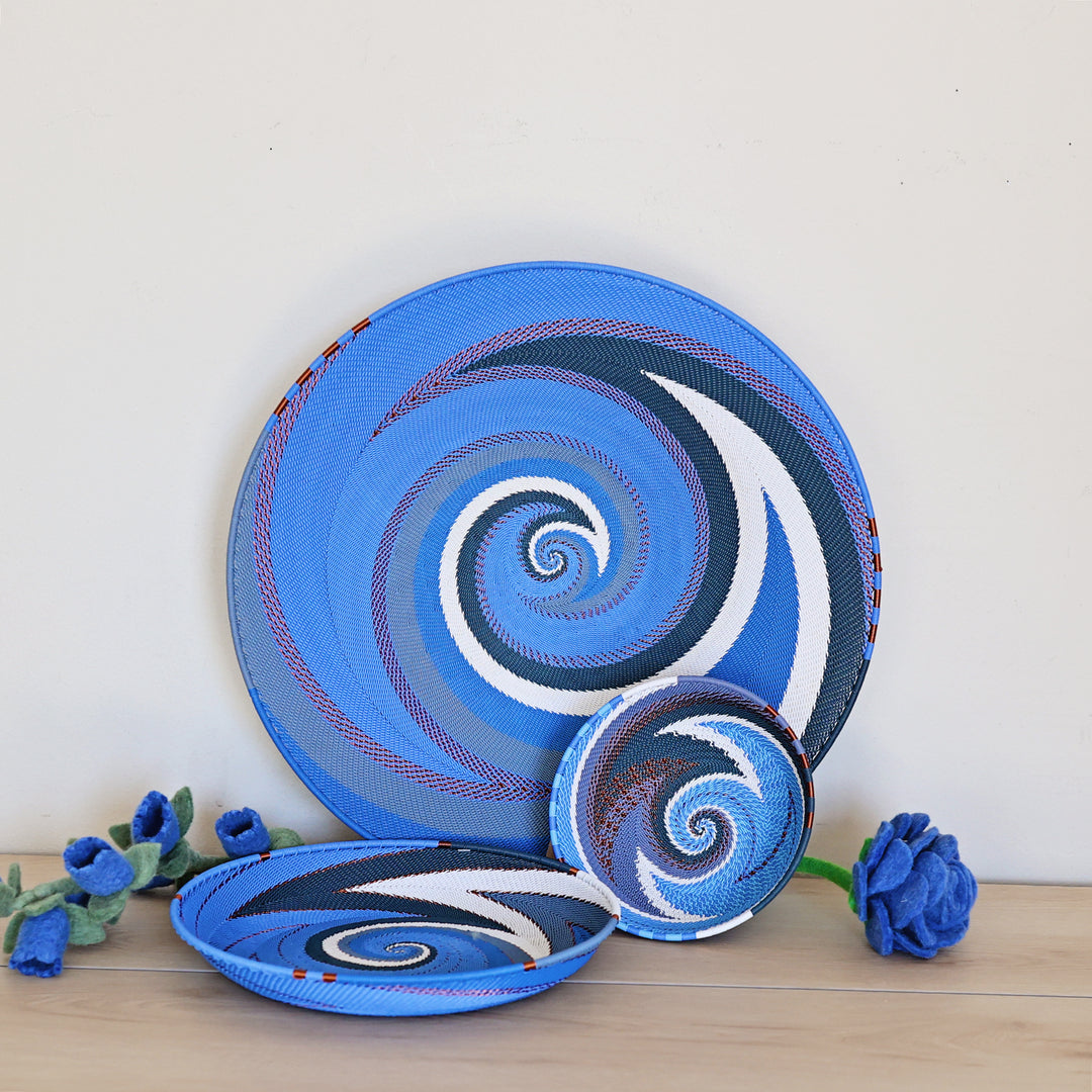 Beach Zulu Large Tray handwoven in South Africa with brilliant blue, navy, and white in a diagonal stripe pattern.