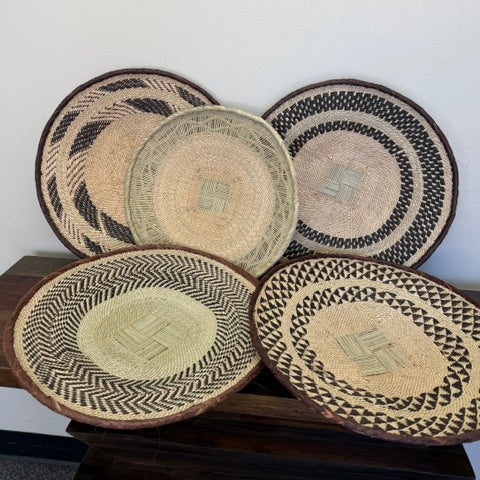 Assorted handwoven Binga bowls from Zimbabwe with unique geometric patterns made by BaTonga artisans.