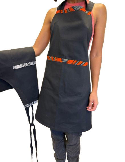 Alt: Black African print apron handmade in Kenya from 100% cotton with vibrant patterned accents.