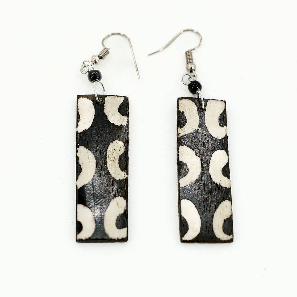 Black and white bone rectangle earrings on fish hooks.
