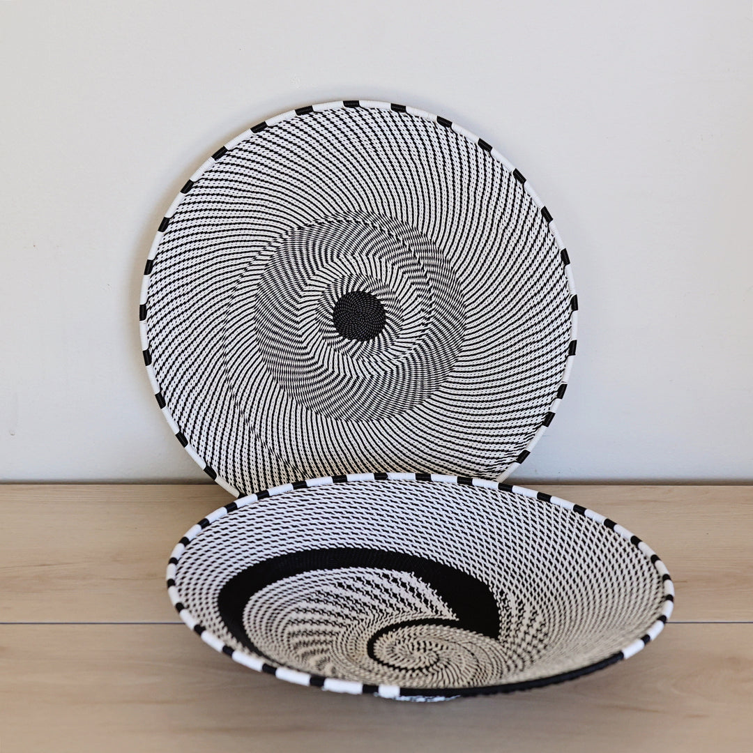Black & White Zulu Extra Large Shallow Basket handwoven in South Africa with a classic black and white diagonal stripe pattern.