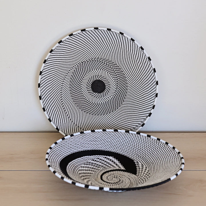 Black & White Zulu Extra Large Shallow Basket handwoven in South Africa with a classic black and white diagonal stripe pattern.