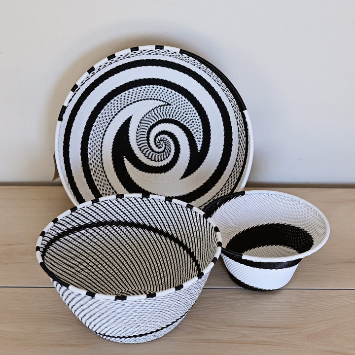 Black & White Zulu Small Flared Bowl handwoven in South Africa with a classic black and white diagonal stripe pattern.