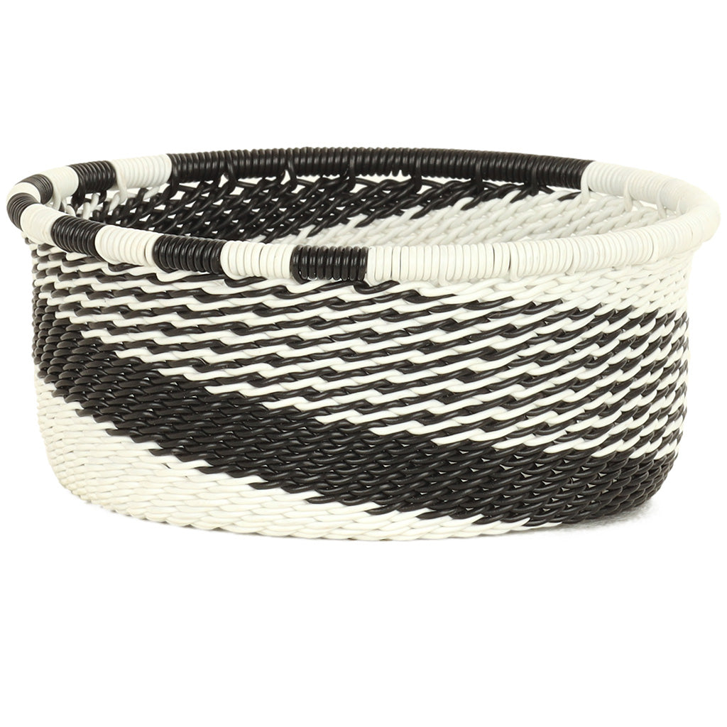 Handwoven Zulu Wire Tuna Cup Baskets in Black and White from South Africa in a variety of colorful and neutral artisan patterns.