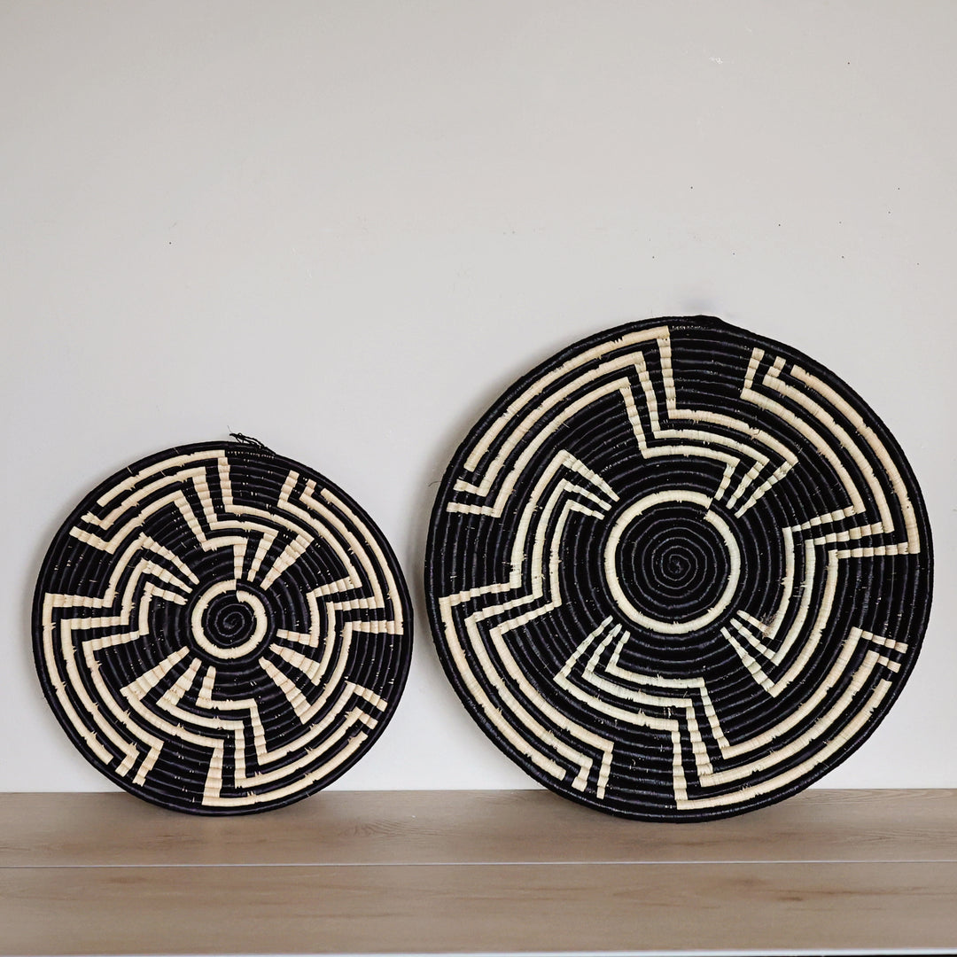 Handwoven Black & White Labyrinth Bukedo and Raffia bowl handmade in Uganda with a bold maze-inspired geometric design.