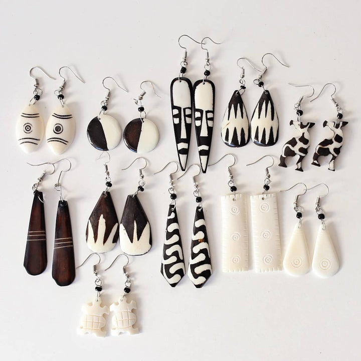 Black and white bone earrings on fish hooks, set of 12