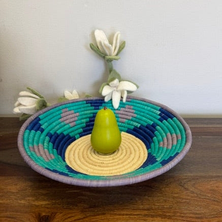 Decorative Bukedo and Raffia bowl in turquoise, natural and lilac.