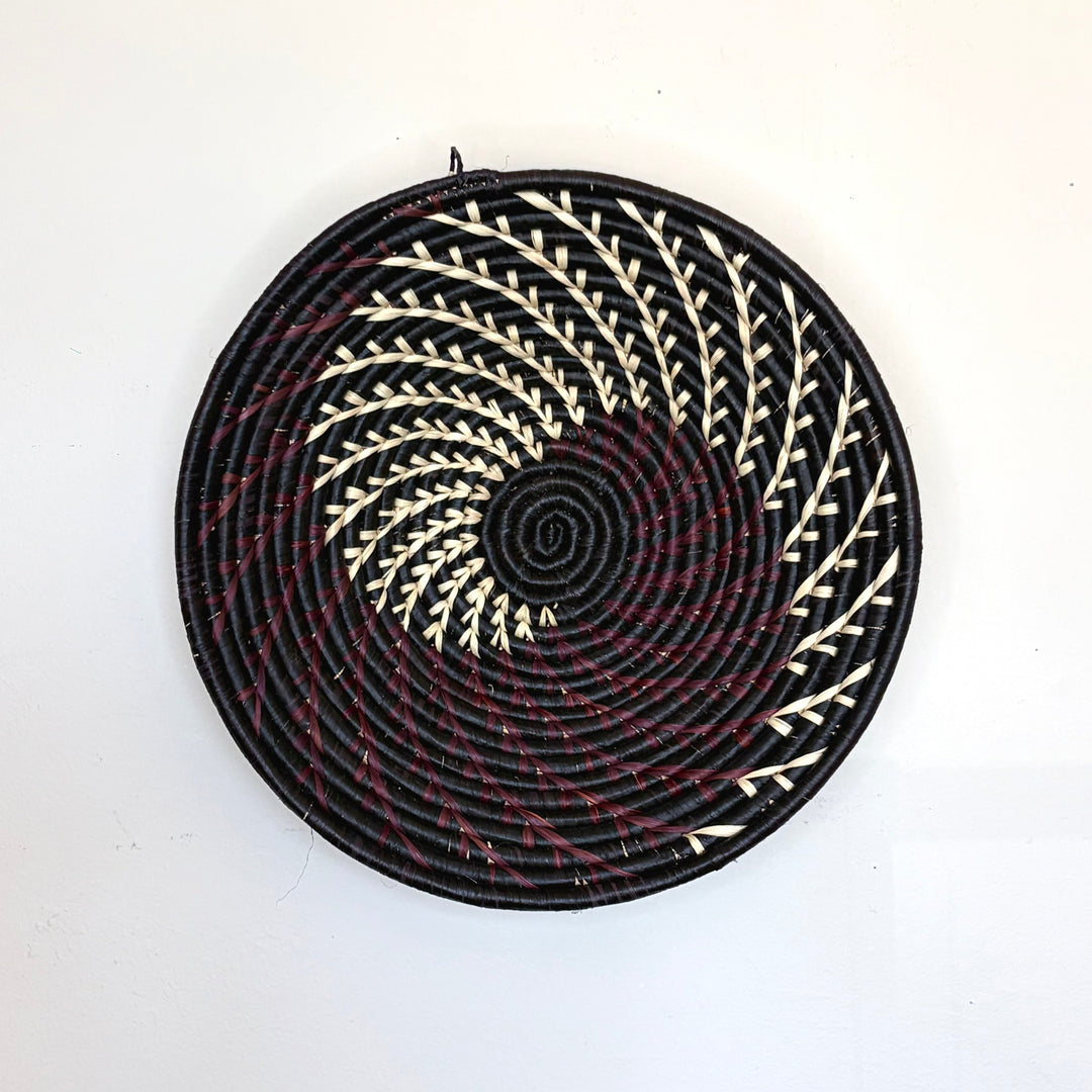 Handmade burgundy, black and white fruit bowl. Handmade in African by fair-trade artisans.