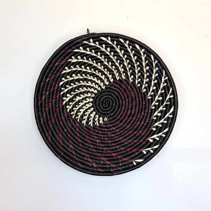 Handmade burgundy, black and white fruit bowl. Handmade in African by fair-trade artisans.