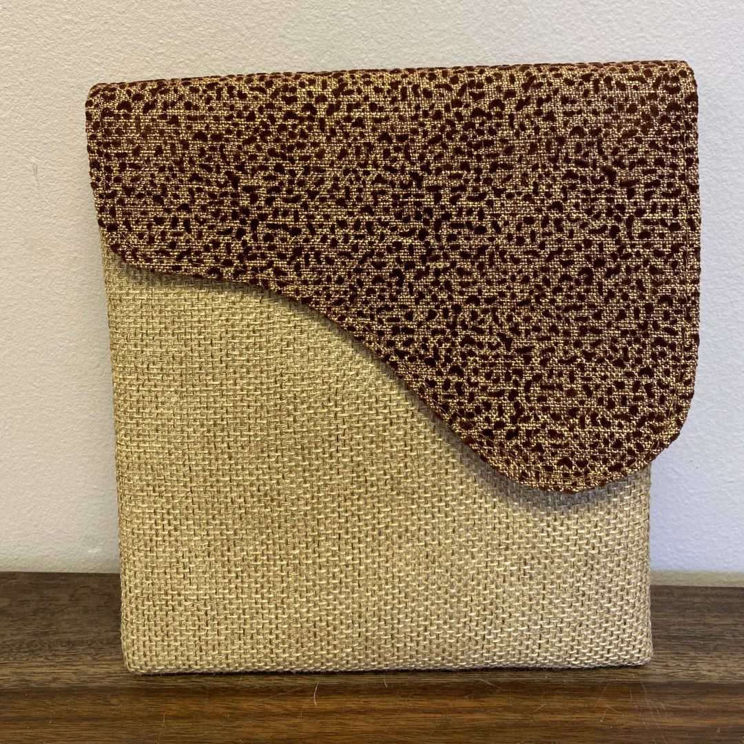 cheetah printed flap crossbody bag with a khaki base.