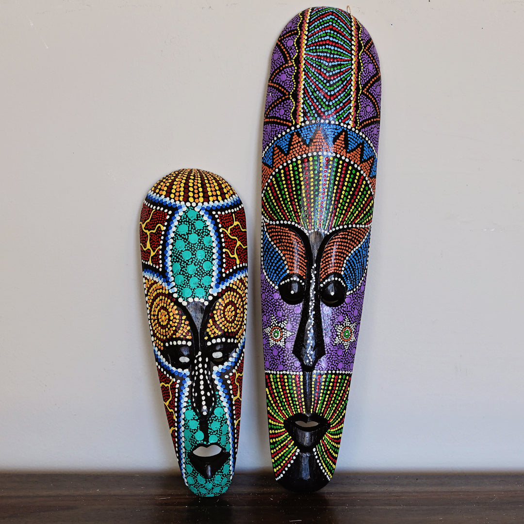 Colorful artisan mask with rainbow dots design handmade for home decor