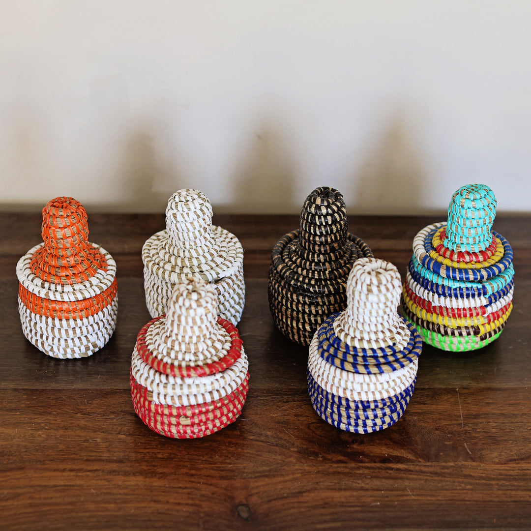 Set of six colorful mini sweetgrass baskets with lids, artisan made.