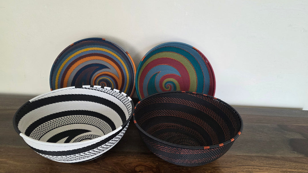 Colorful Zulu wire bowl featuring intricate geometric weaving handcrafted by artisans.