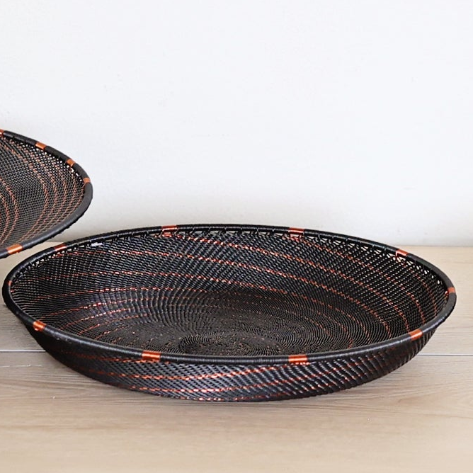 Copper & Black Zulu Large Tray handwoven in South Africa with a rich black base and shimmering bare copper wire accents.