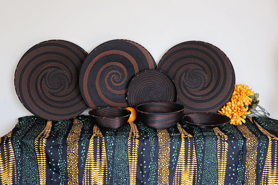 Copper & Black Zulu Deep Bowl handwoven in South Africa with a rich black base and shimmering bare copper wire accents.