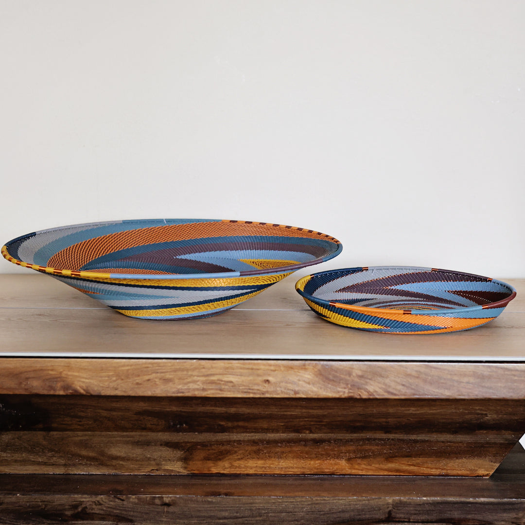 Cove Zulu Wire Trays handwoven in South Africa with intricate woven patterns in layered coastal and earthy tones.