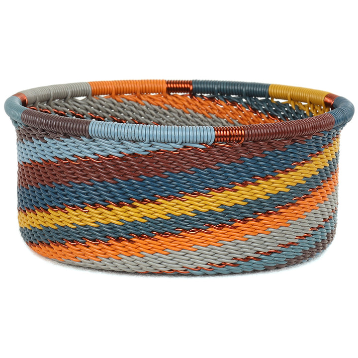Handwoven Zulu Wire Tuna Cup Baskets in Cove from South Africa in a variety of colorful and neutral artisan patterns.