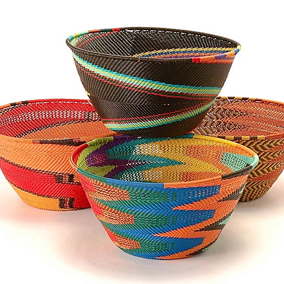 Dark Earth Zulu Deep Bowl handwoven in South Africa with rich brown, rust, golden yellow, and olive tones.