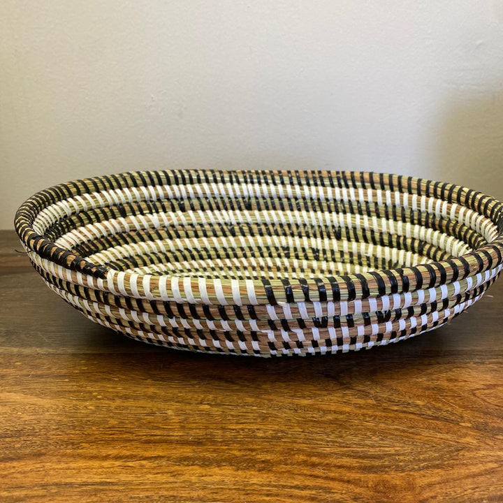 Decorative oval basket wall art made from sweetgrass with hanging loop