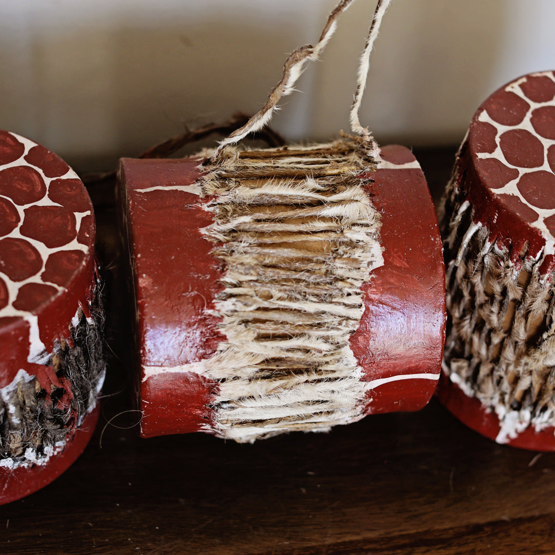 Three wooden fair trade wooden drums with goat skin, handmade in Kenya.